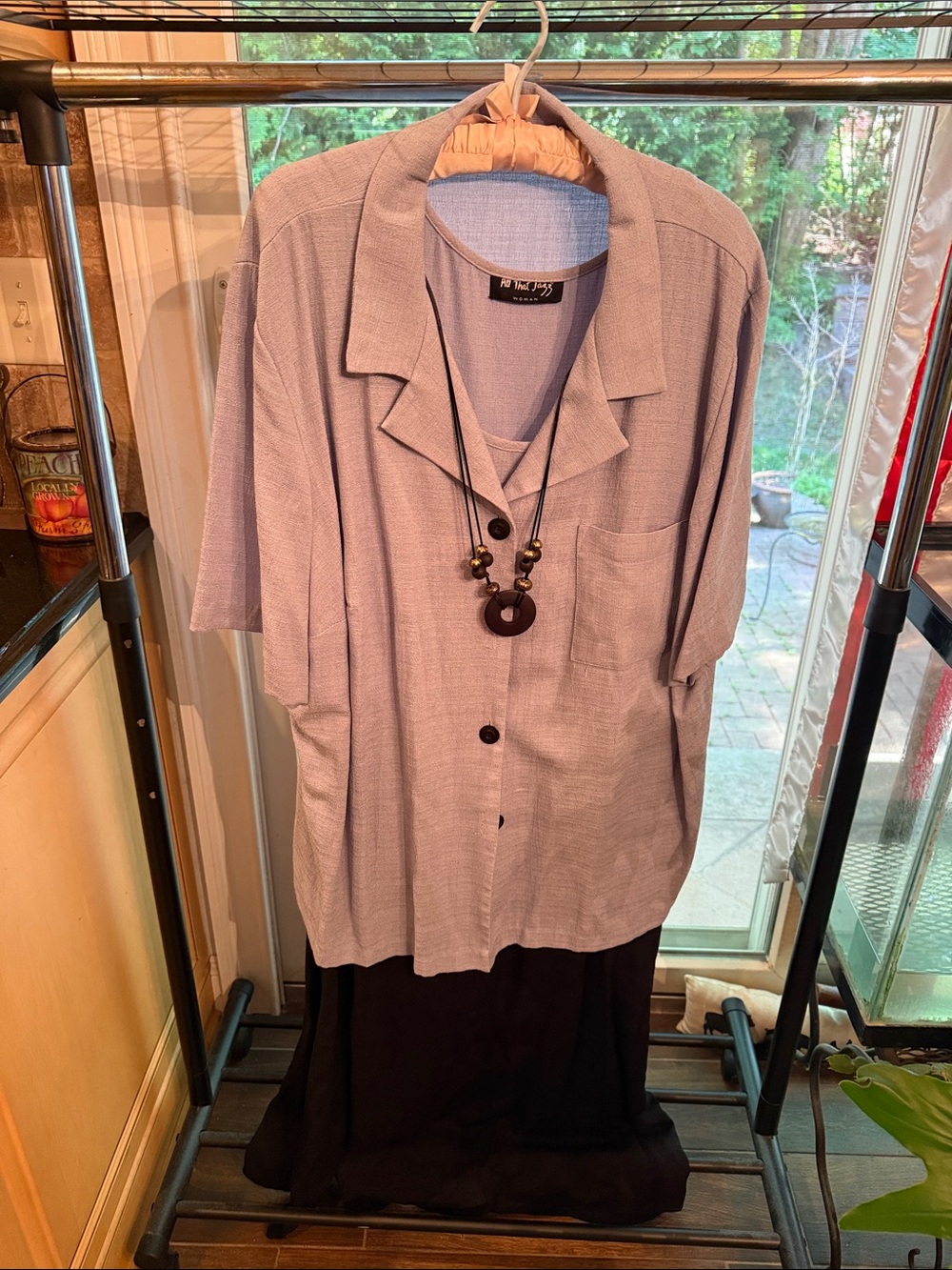 Light Lavender Short-Sleeve Button Shirt with Necklace over full length dress.